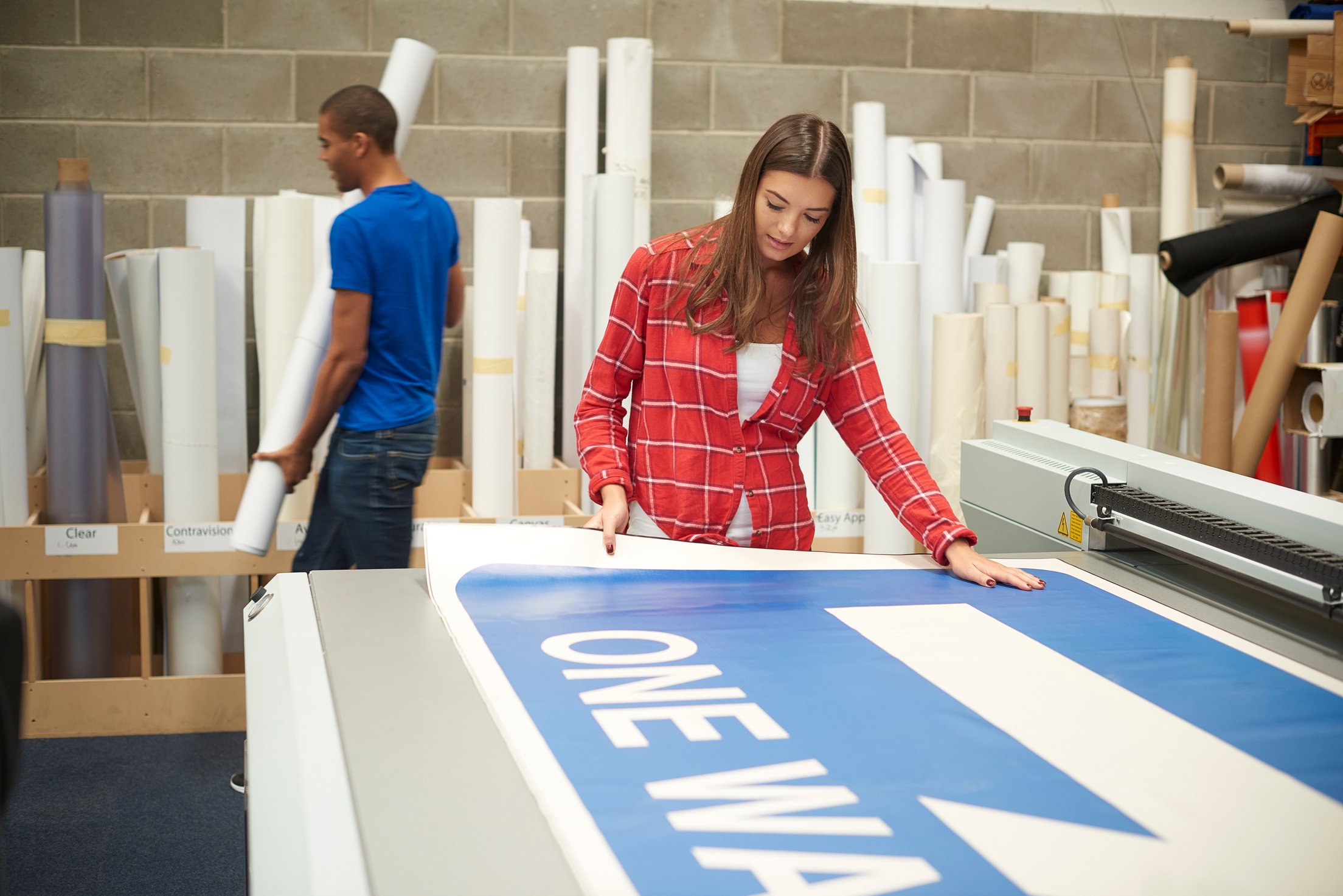 young woman working at a digital printing company